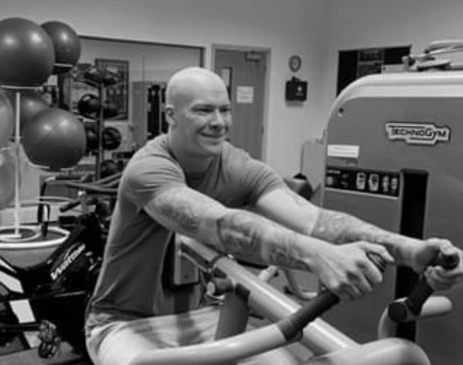 Dan working out in gym