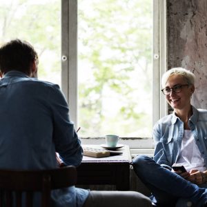 Two people chatting at counselling session