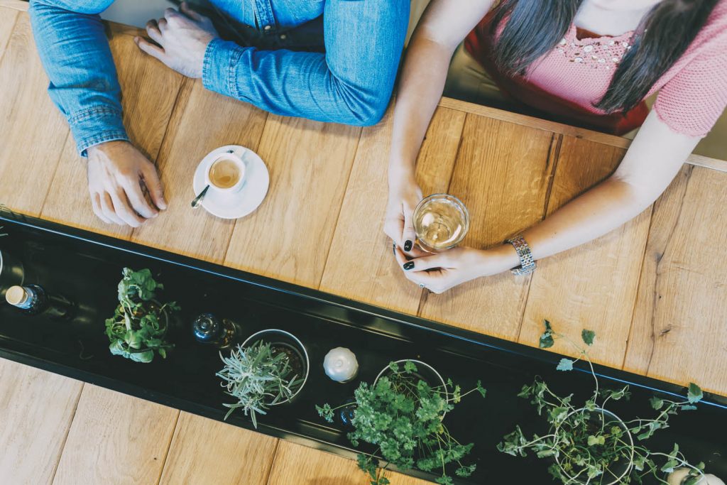 Two people from above a coffee shop