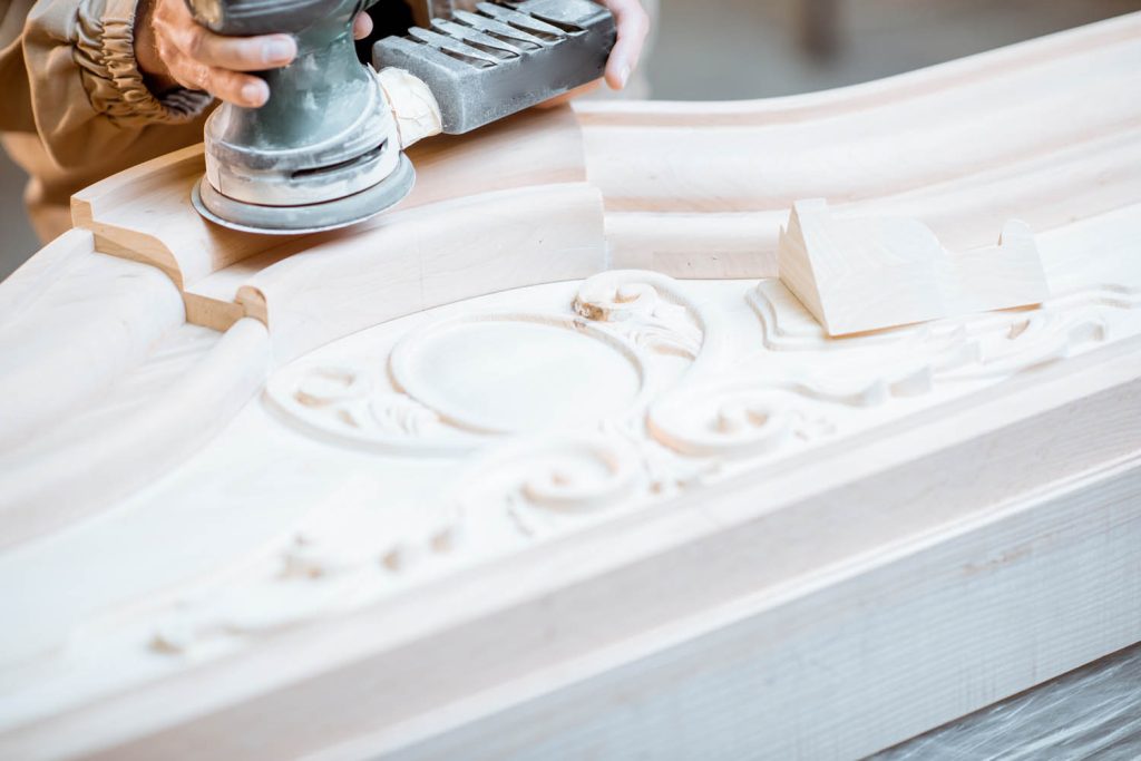 Sanding wooden carvings