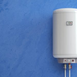 Hot water boiler against a blue wall