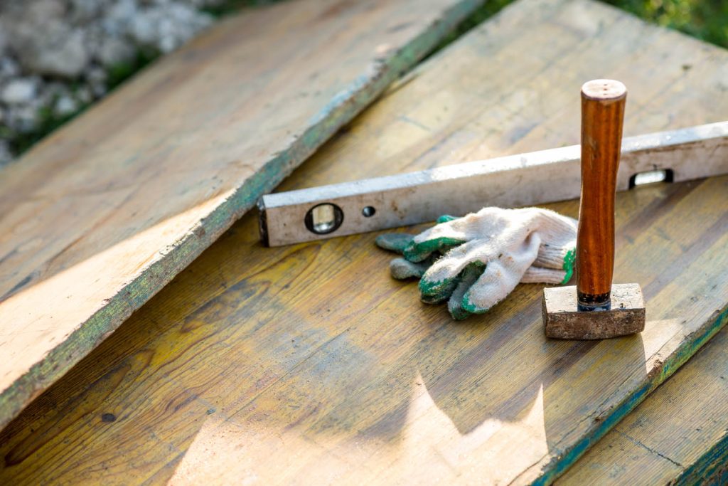 Construction tools on planks of wood