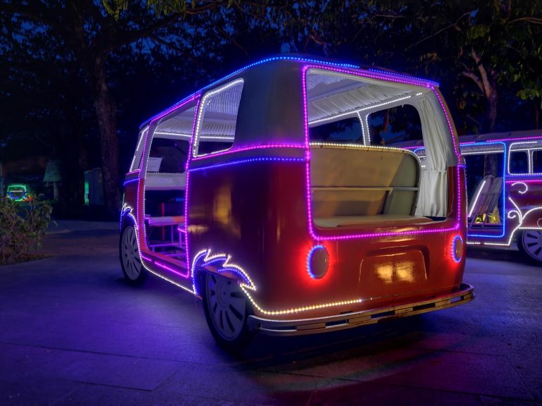 old van covered in neon lights
