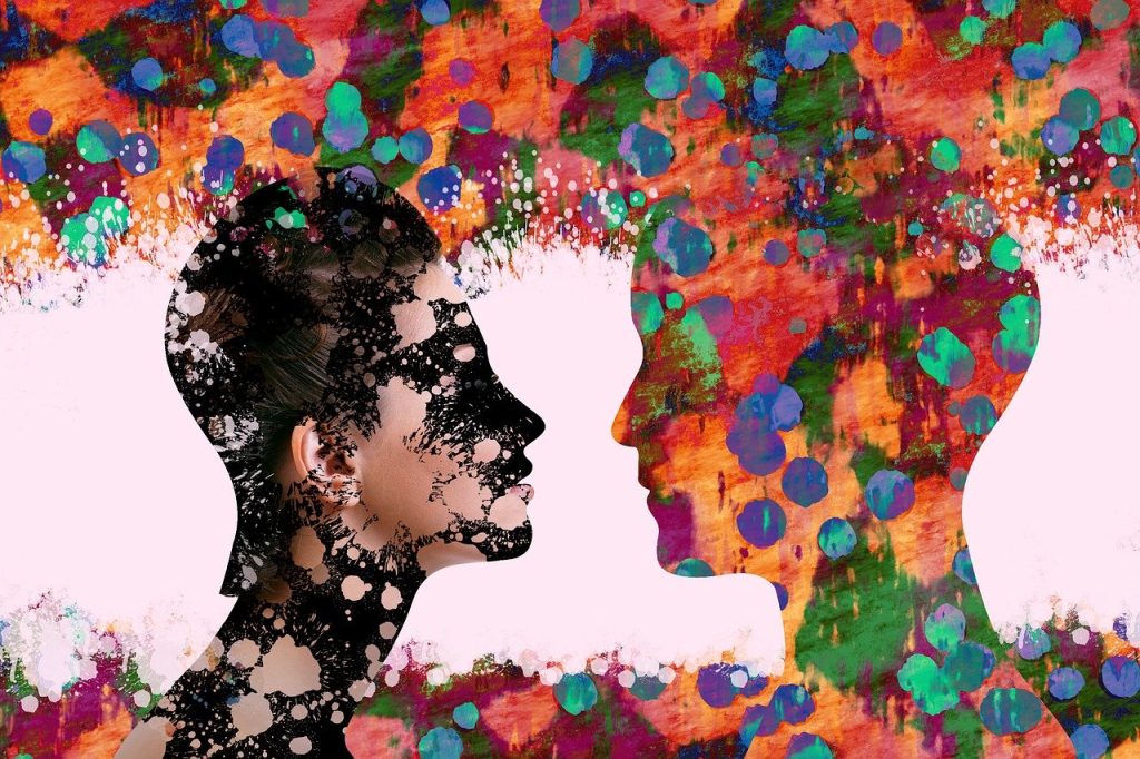 Colourful abstract images of the profile of two heads