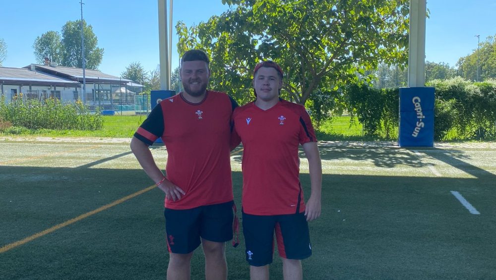 Aled Water (left) wearing rugby kit