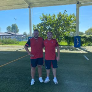 Aled Water (left) wearing rugby kit